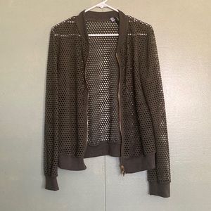 geeen jacket with holes!